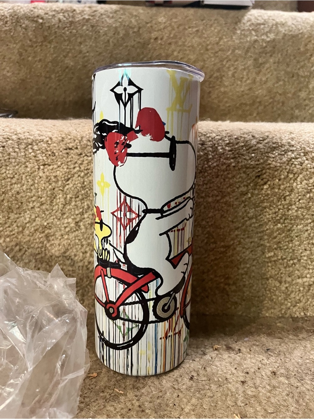 White Snoopy Bike Stainless Travel Tumbler with Red Accents